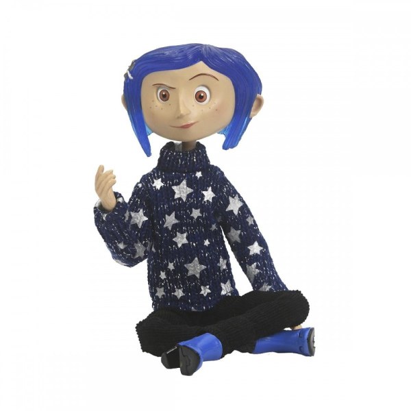 CORALINE EN SUÉTER DE ESTRELLA