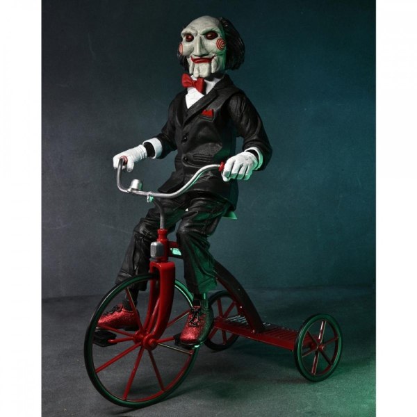 SAW – FIGURA DE ACCIÓN – BILLY SONIDO EN SU TRICICLO