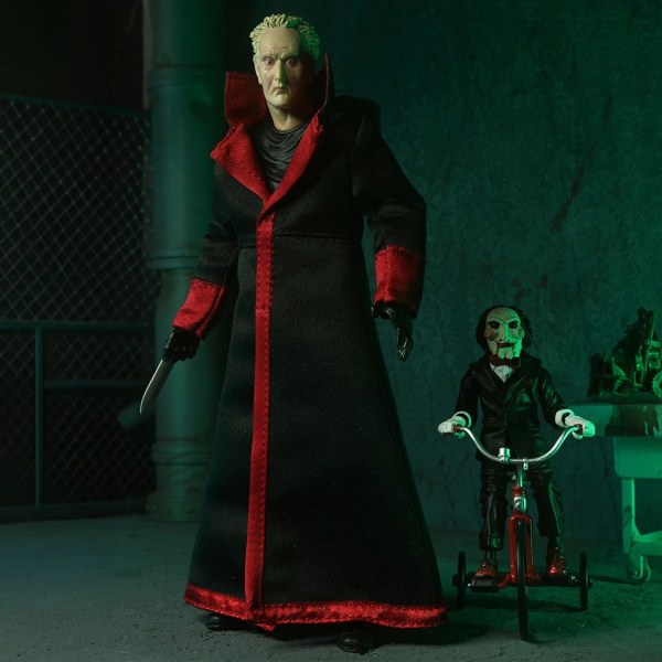 SAW (FRANQUICIA) - FIGURA DE ACCIÓN A ESCALA DE 7” - ULTIMATE JIGSAW KILLER (TÚNICA NEGRA)