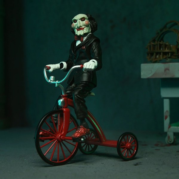 SAW (FRANQUICIA) - FIGURA DE ACCIÓN A ESCALA DE 7” - ULTIMATE JIGSAW KILLER (TÚNICA NEGRA)