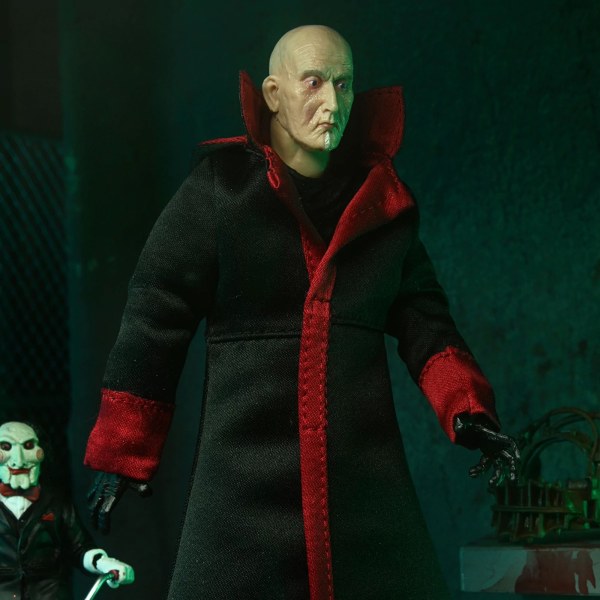 SAW (FRANQUICIA) - FIGURA DE ACCIÓN A ESCALA DE 7” - ULTIMATE JIGSAW KILLER (TÚNICA NEGRA)