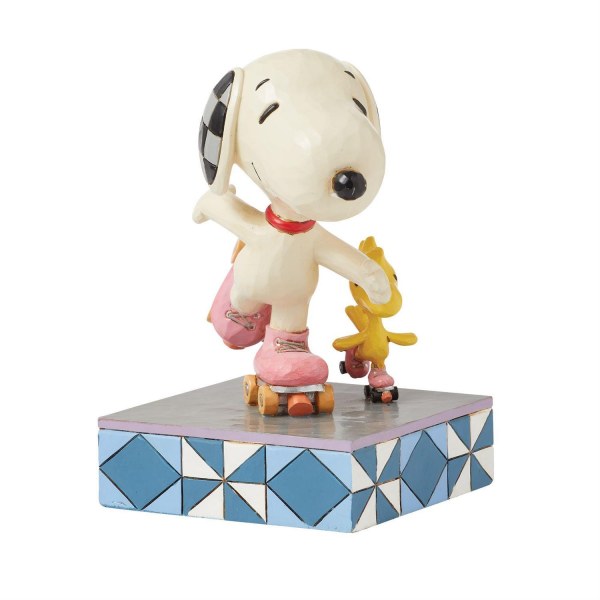 Snoopy y Woodstock patinan - Peanuts