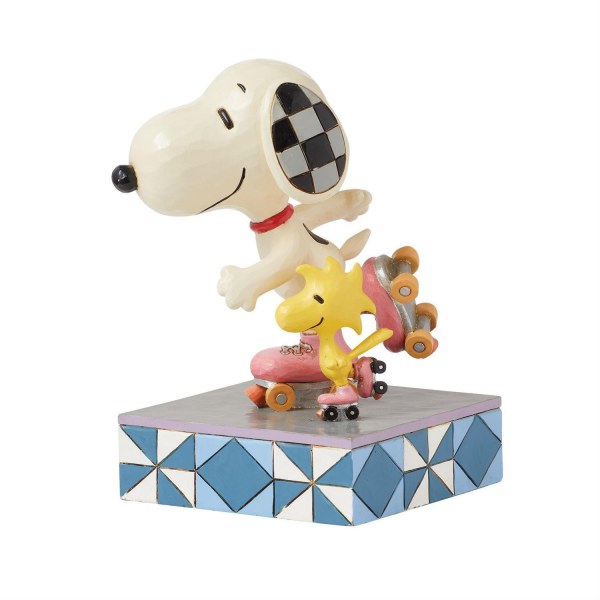 Snoopy y Woodstock patinan - Peanuts