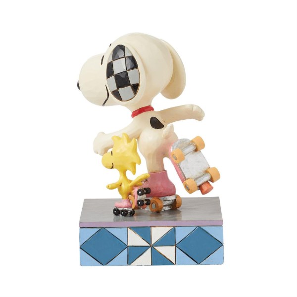 Snoopy y Woodstock patinan - Peanuts