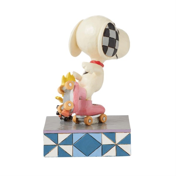 Snoopy y Woodstock patinan - Peanuts