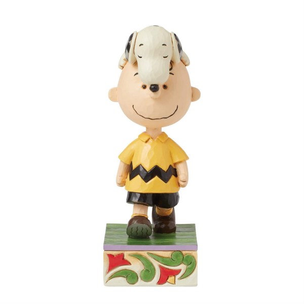 Snoopy en la cabeza de Charlie Brown - Peanuts