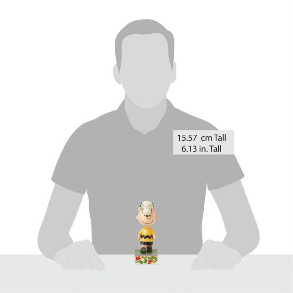Snoopy en la cabeza de Charlie Brown - Peanuts