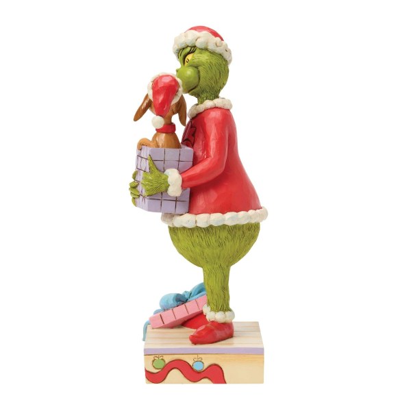 El Grinch sosteniendo un regalo - JIM SHORE GRINCH