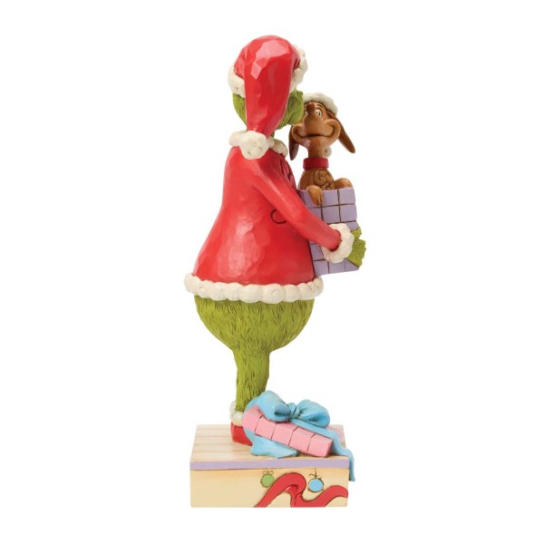 El Grinch sosteniendo un regalo - JIM SHORE GRINCH