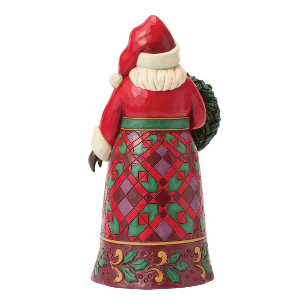 Papá Noel con figura de flor de Pascua - Heartwood Creek