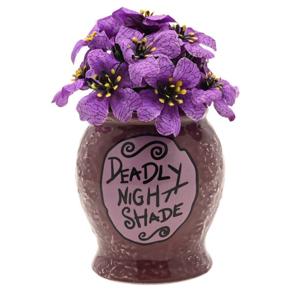 Maceta de Disney Nightmare Before Christmas con diseño de belladona y planta artificial.