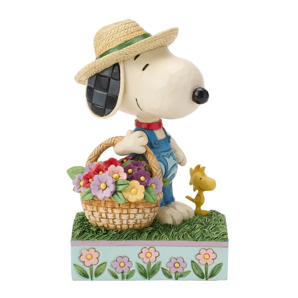 Snoopy sosteniendo una cesta de flores - Peanuts