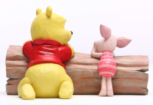 WINNIE Y LECHÓN EN EL TRONCO - DISNEY TRADITIONS