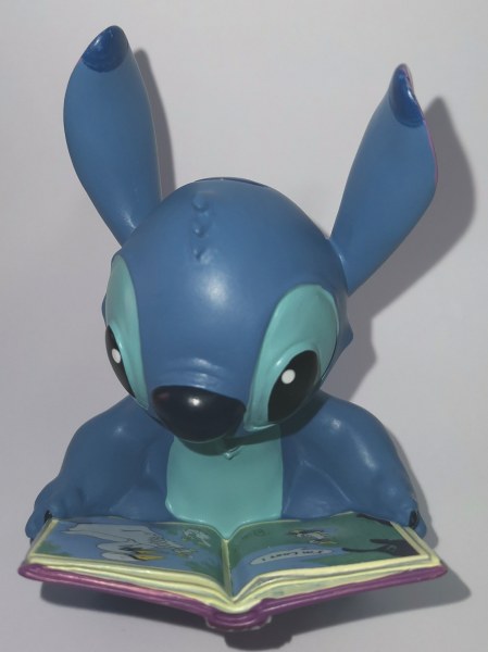 MINI STITCH CON LIBRO - DISNEY SHOWCASE