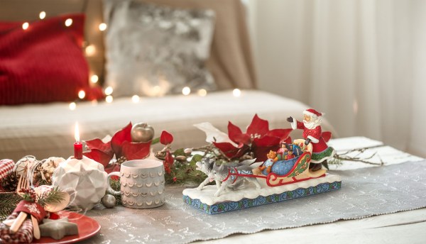 PAPÁ NOEL EN DOGSLEDGE- JIM SHORE HEARTWOOD CREEK