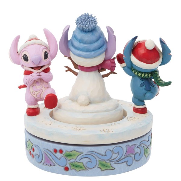 STITCH Y ANGEL CONSTRUYEN UN MUÑECO DE NIEVE GIRATORIO - DISNEY TRADITIONS