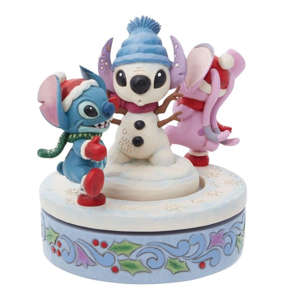 STITCH Y ANGEL CONSTRUYEN UN MUÑECO DE NIEVE GIRATORIO - DISNEY TRADITIONS