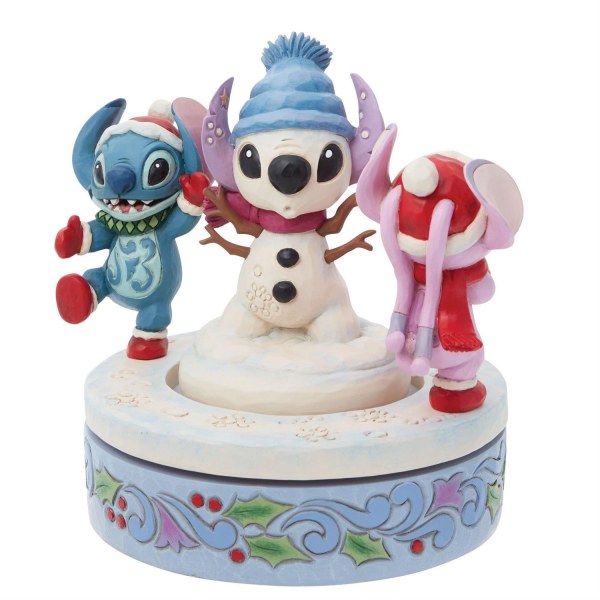 STITCH Y ANGEL CONSTRUYEN UN MUÑECO DE NIEVE GIRATORIO - DISNEY TRADITIONS