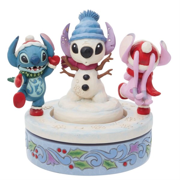 STITCH Y ANGEL CONSTRUYEN UN MUÑECO DE NIEVE GIRATORIO - DISNEY TRADITIONS
