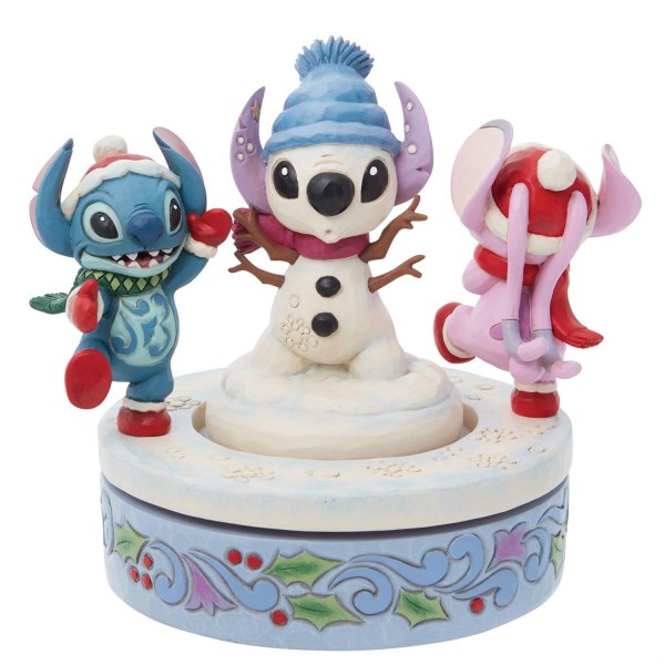 STITCH Y ANGEL CONSTRUYEN UN MUÑECO DE NIEVE GIRATORIO - DISNEY TRADITIONS